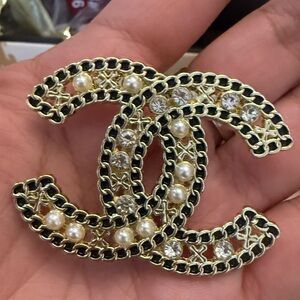 Gold and Black Brooch with Pearls